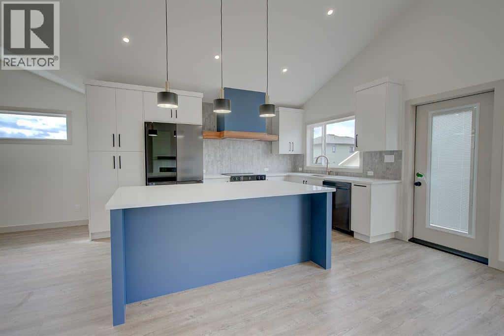 18 Trout Avenue — Red Deer, Alberta - Photo 5 of 36