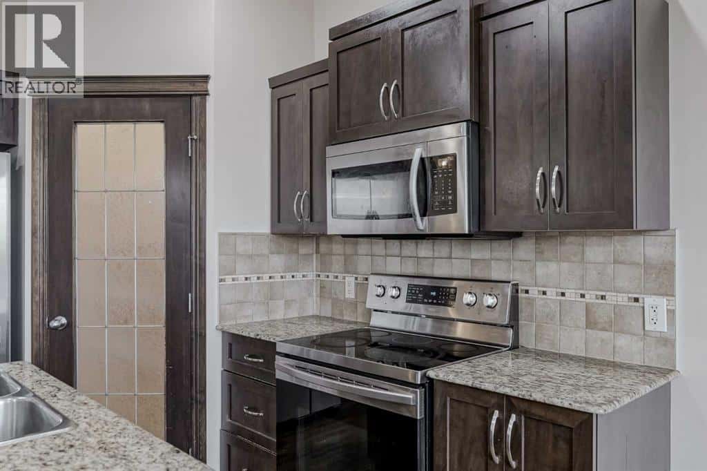 206 Pantego View NW — Calgary, Alberta - Photo 5 of 50