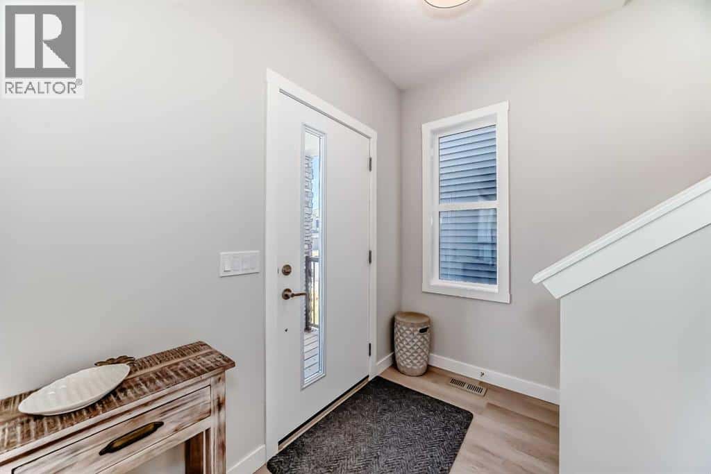 934 Cobblemore Common SW — Airdrie, Alberta - Photo 4 of 46