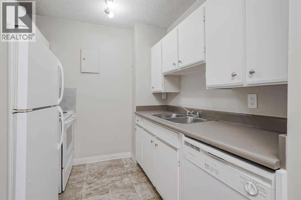 514, 4944 Dalton Drive NW — Calgary, Alberta - Photo 3 of 33