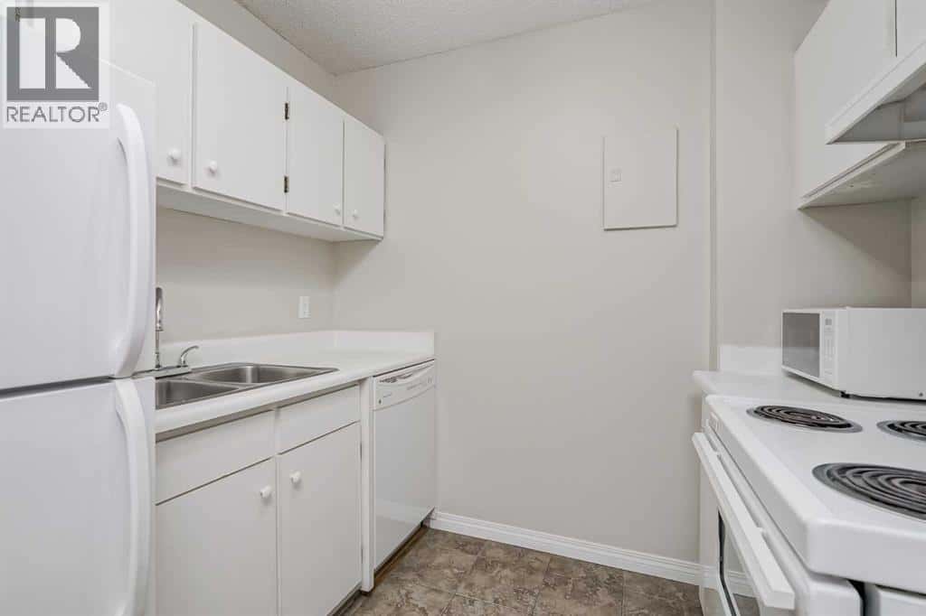 307, 4944 Dalton Drive NW — Calgary, Alberta - Photo 5 of 27