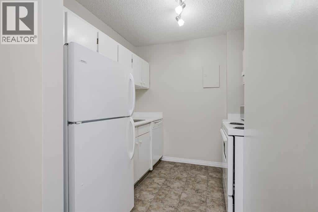 307, 4944 Dalton Drive NW — Calgary, Alberta - Photo 4 of 27