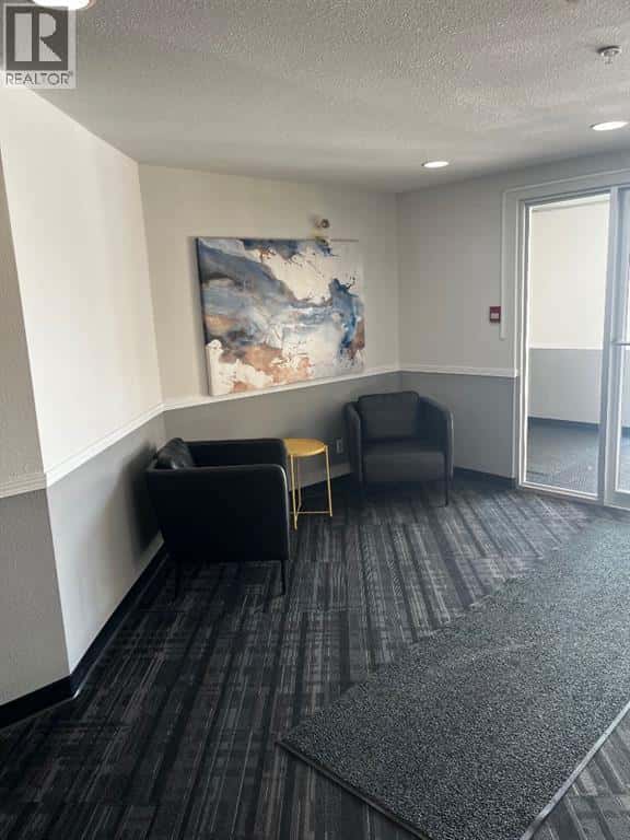 2112, 2518 Fish Creek Boulevard SW — Calgary, Alberta - Photo 2 of 8