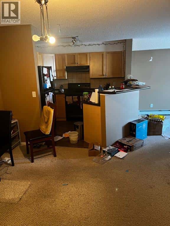 2112, 2518 Fish Creek Boulevard SW — Calgary, Alberta - Photo 3 of 8