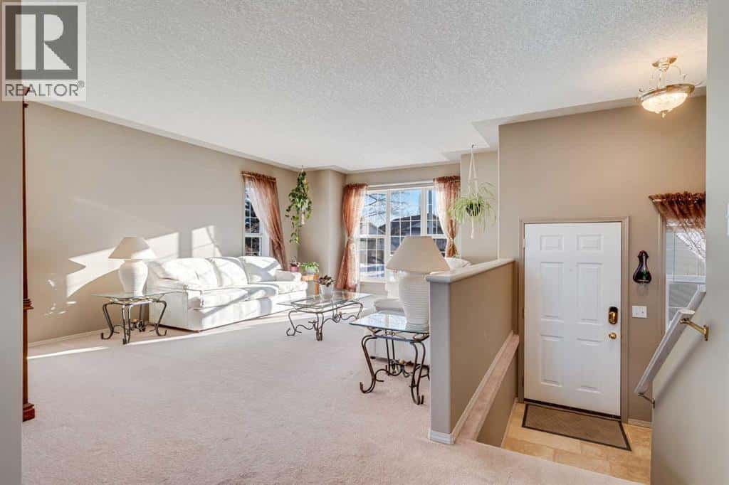 308 Highwood Village Place NW — High River, Alberta - Photo 3 of 50