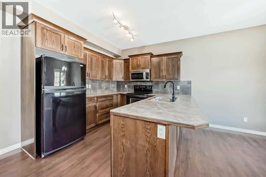 9, 4603 Ryders Ridge Boulevard — Sylvan Lake, Alberta - Photo 5 of 45