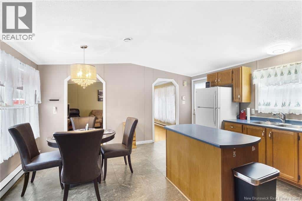 60 Memorial Drive — Minto, New Brunswick - Photo 4 of 40