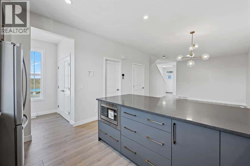 329 Ambleton Drive NW — Calgary, Alberta - Photo 4 of 15