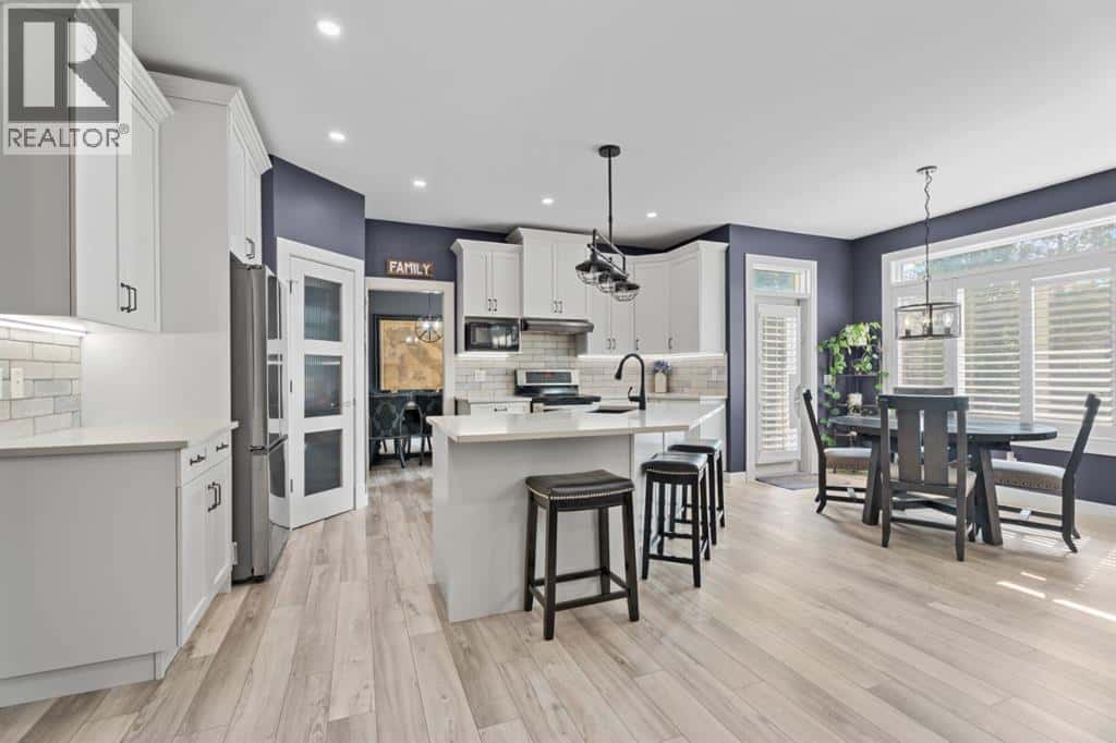 15 Drake Landing Drive — Okotoks, Alberta - Photo 4 of 46