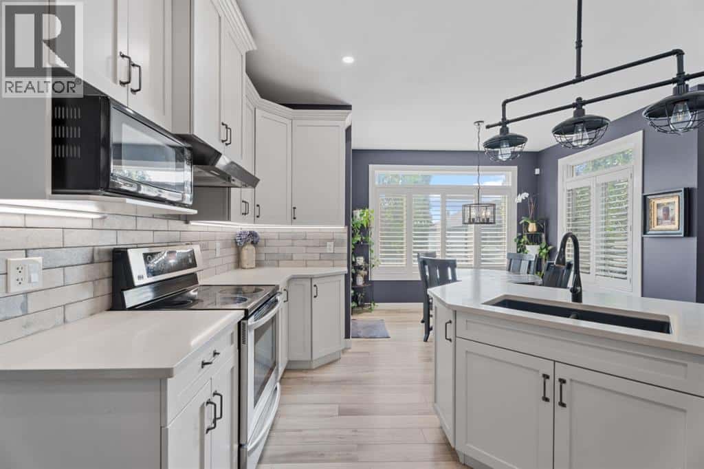 15 Drake Landing Drive — Okotoks, Alberta - Photo 5 of 46