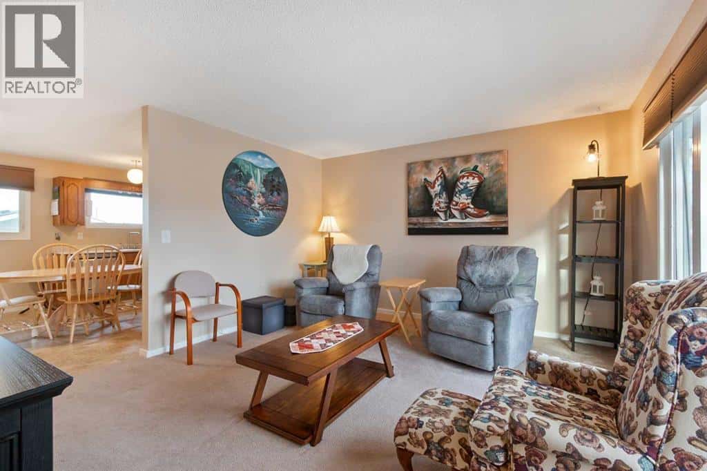 127 Edey Close — Cremona, Alberta - Photo 5 of 33