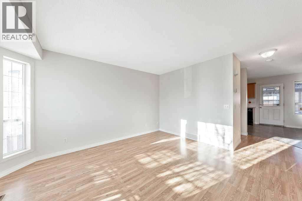 154 Bridleridge Circle SW — Calgary, Alberta - Photo 5 of 36