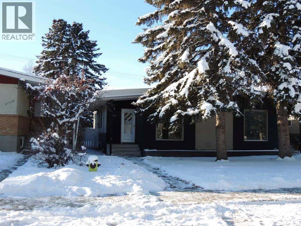 2713 Canmore Road NW — Calgary, Alberta - Photo 3 of 50