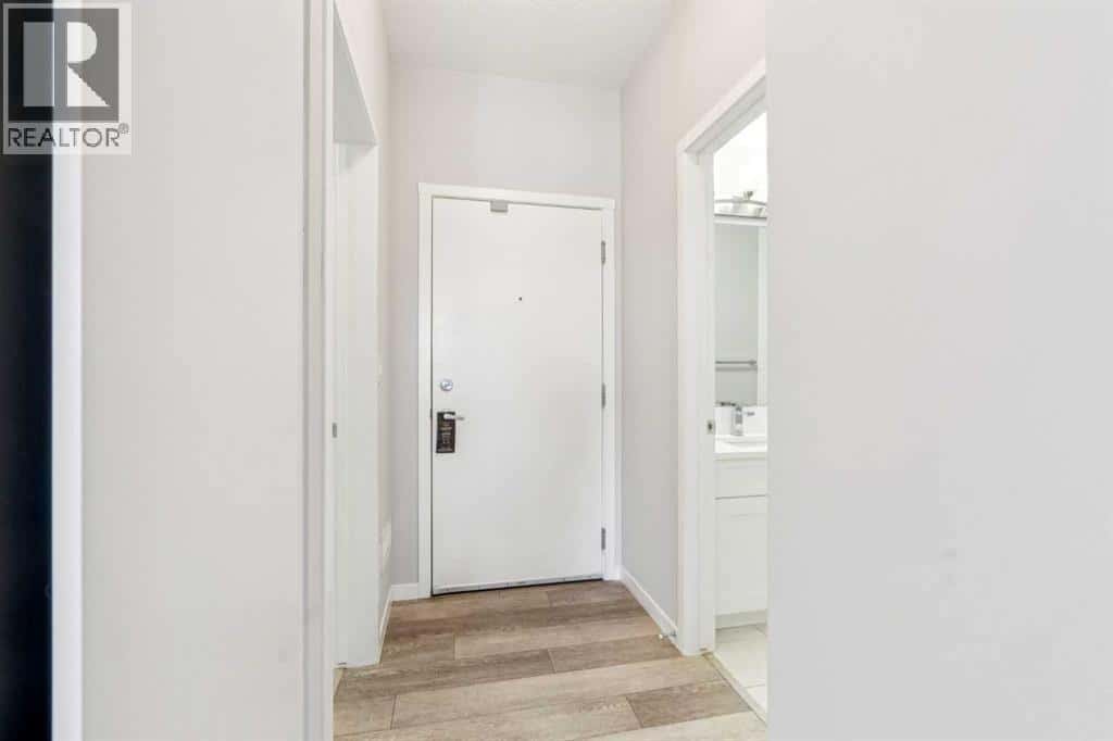 407, 370 Harvest Hills Common NE — Calgary, Alberta - Photo 4 of 28