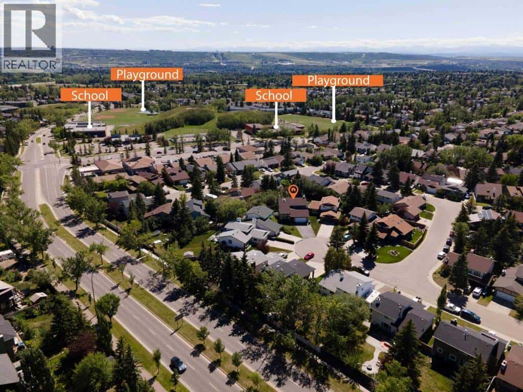 303 Ranchridge Bay NW — Calgary, Alberta - Photo 3 of 50