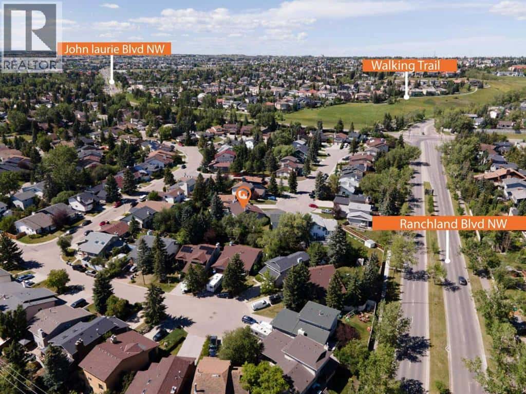 303 Ranchridge Bay NW — Calgary, Alberta - Photo 5 of 50