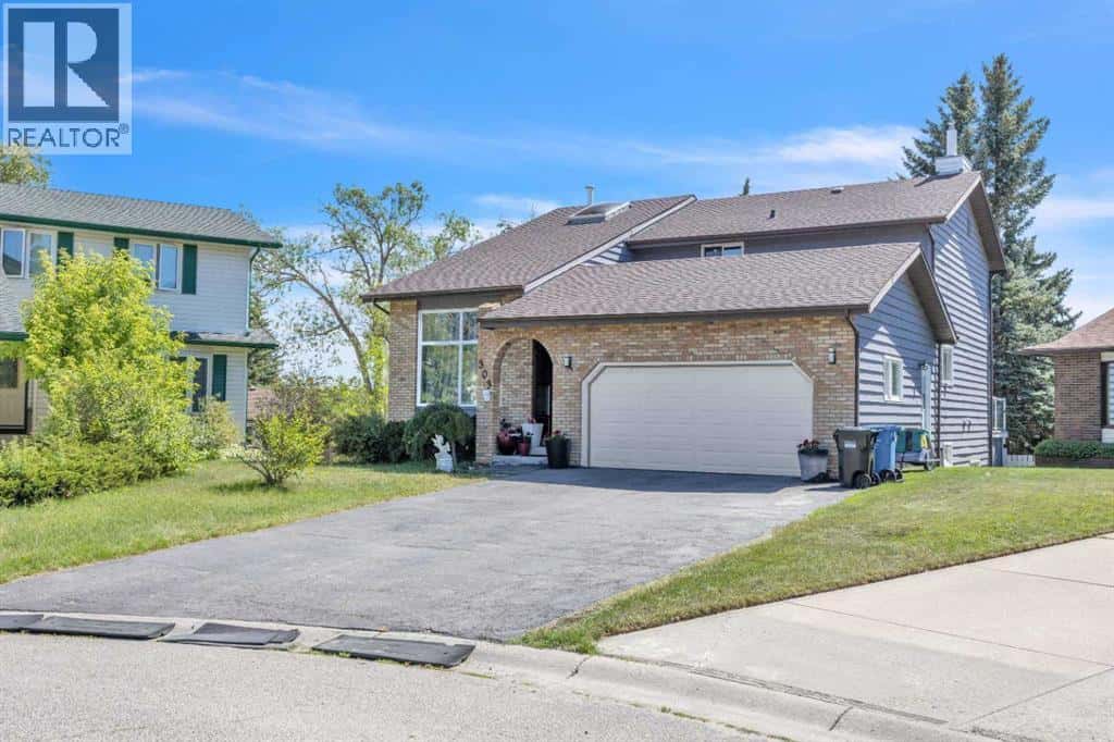 303 Ranchridge Bay NW — Calgary, Alberta - Photo 2 of 50