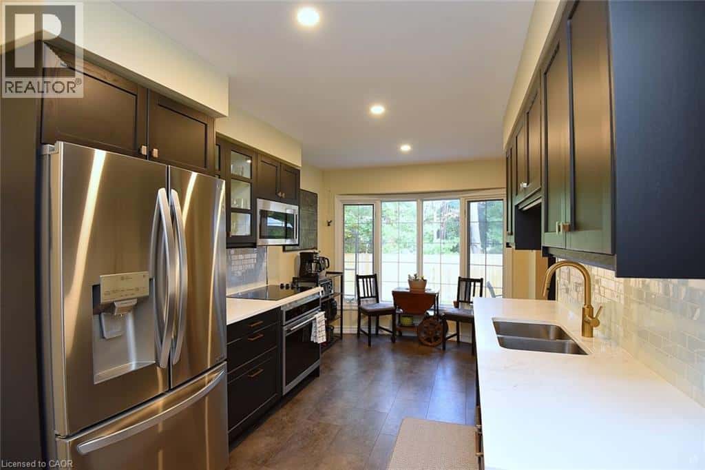 175 FIDDLERS GREEN Road Unit# 59 — Ancaster, Ontario - Photo 4 of 34