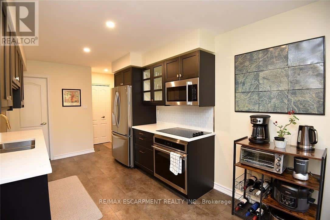 59 - 175 FIDDLERS GREEN ROAD — Hamilton (Ancaster), Ontario - Photo 5 of 34