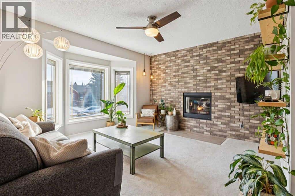 3406 Cedarille Drive SW — Calgary, Alberta - Photo 2 of 27