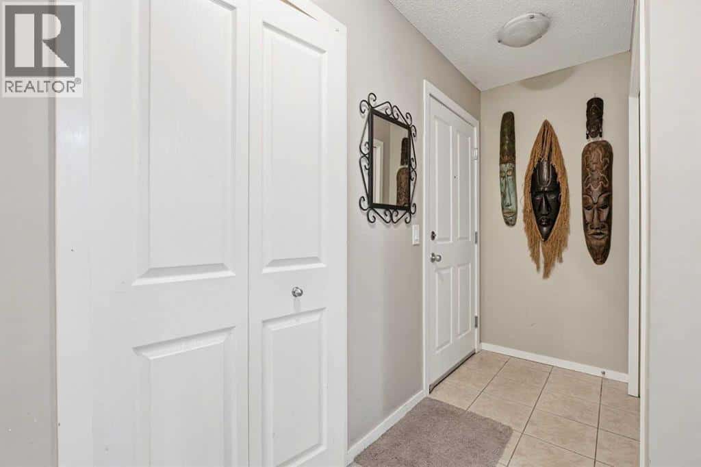 1213, 4 Kingsland Close SE — Airdrie, Alberta - Photo 4 of 22