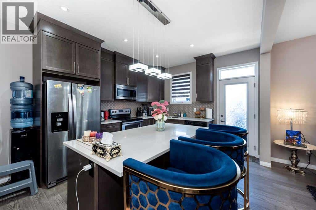 167 Windford Street SW — Airdrie, Alberta - Photo 4 of 34