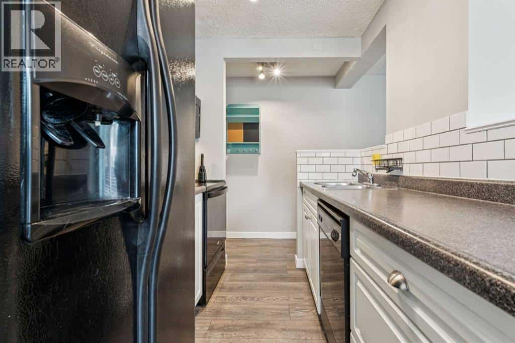 103, 1626 14 Avenue SW — Calgary, Alberta - Photo 5 of 17