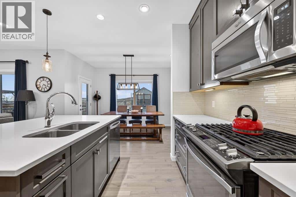 73 FIRESIDE Cove — Cochrane, Alberta - Photo 3 of 42