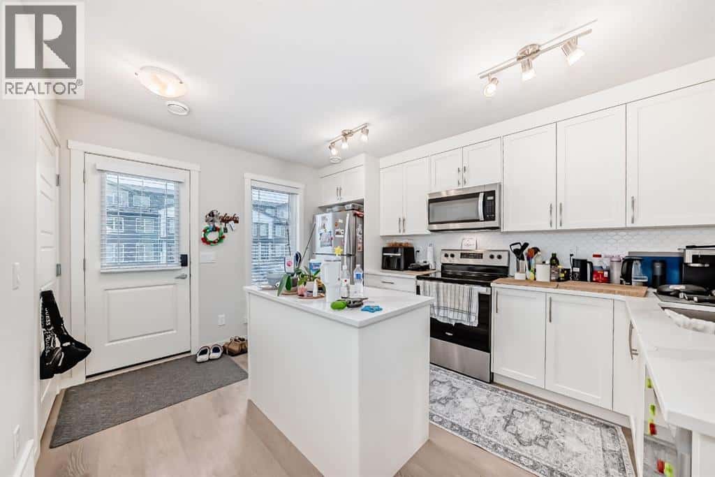 406, 474 Seton Circle SE — Calgary, Alberta - Photo 3 of 22