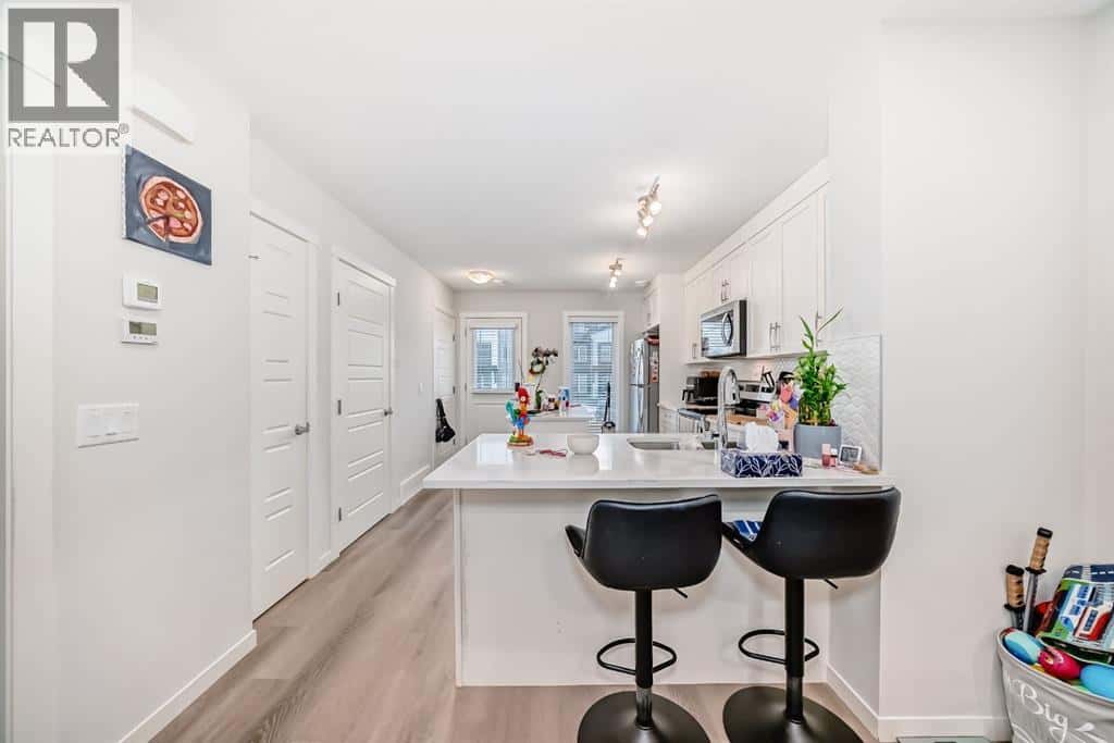 406, 474 Seton Circle SE — Calgary, Alberta - Photo 5 of 22