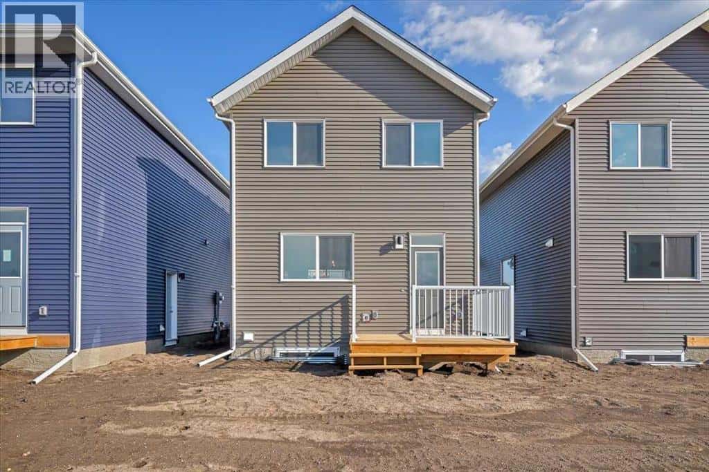 74 Wedderburn Drive — Okotoks, Alberta - Photo 3 of 26