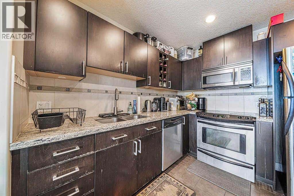 2102, 77 Spruce Place SW — Calgary, Alberta - Photo 5 of 28