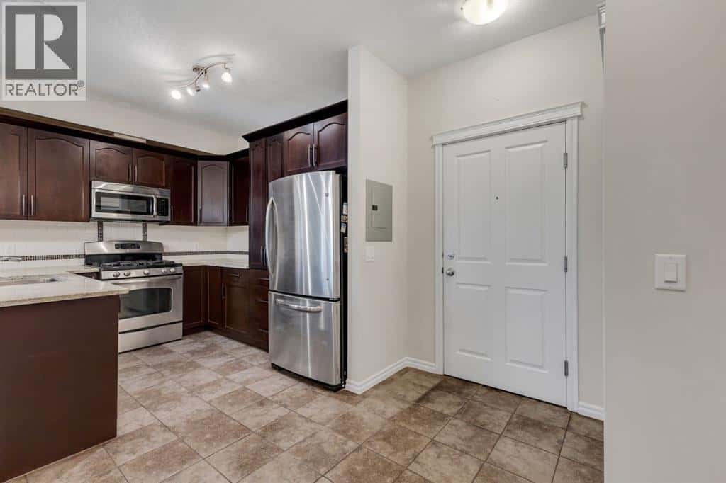 3202, 4 Kingsland Close SE — Airdrie, Alberta - Photo 3 of 30