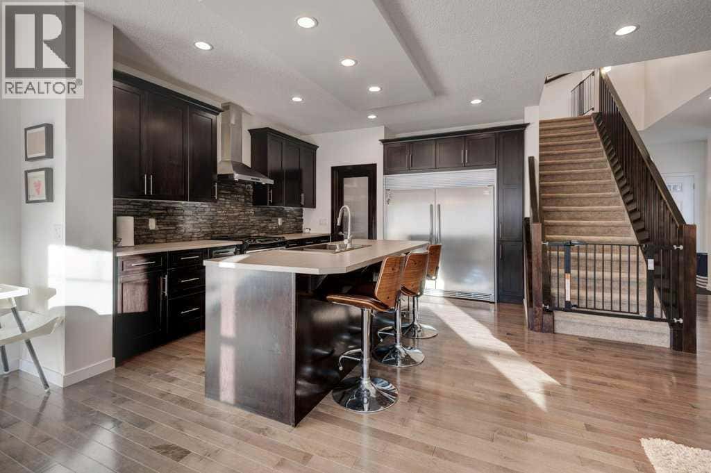 237 Cimarron Vista Way — Okotoks, Alberta - Photo 5 of 36