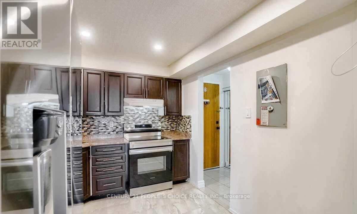 411 - 41 MARKBROOK LANE — Toronto (Mount Olive-Silverstone-Jamestown), Ontario - Photo 3 of 24