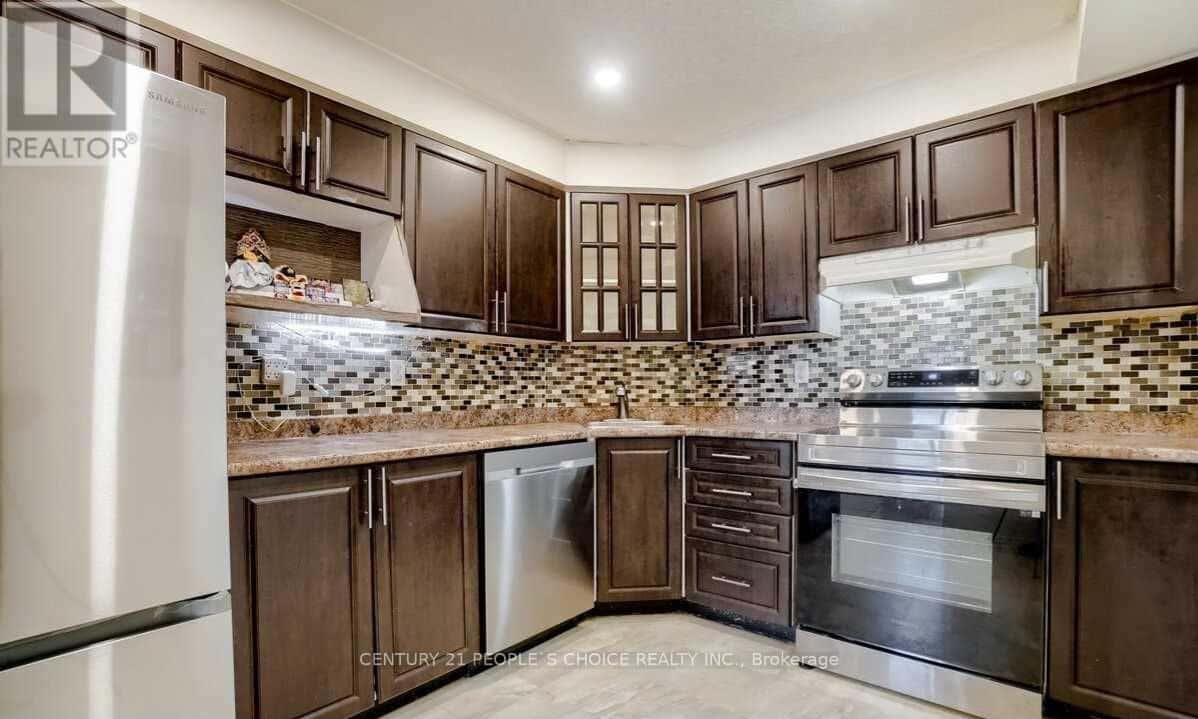 411 - 41 MARKBROOK LANE — Toronto (Mount Olive-Silverstone-Jamestown), Ontario - Photo 4 of 24