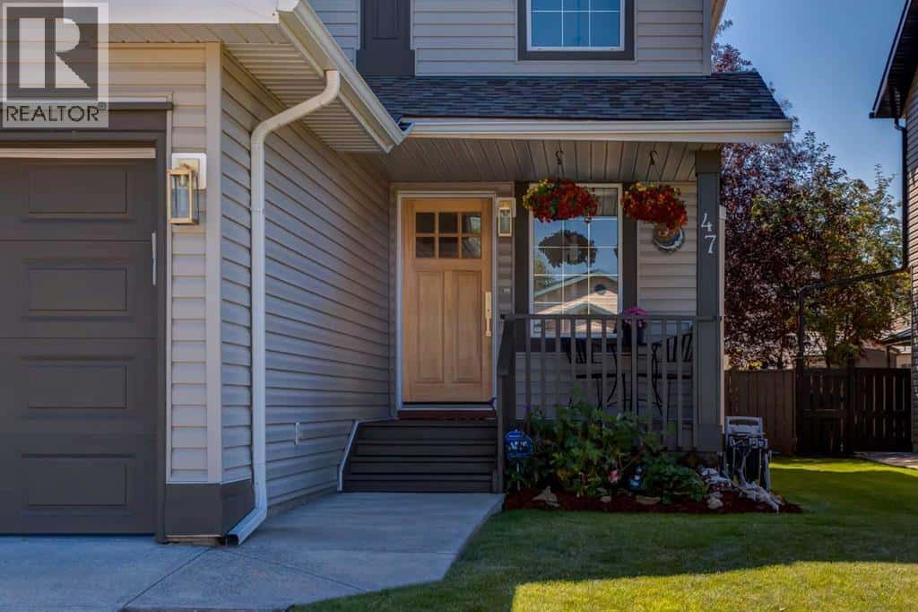 47 Springs Crescent SE — Airdrie, Alberta - Photo 3 of 49