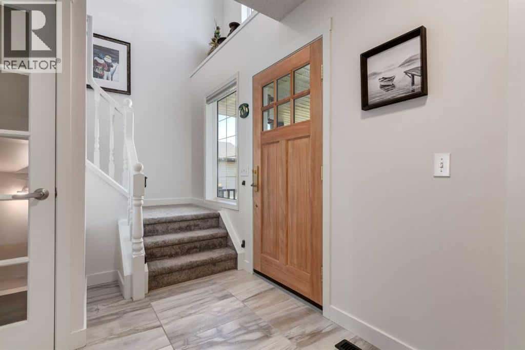 47 Springs Crescent SE — Airdrie, Alberta - Photo 4 of 49