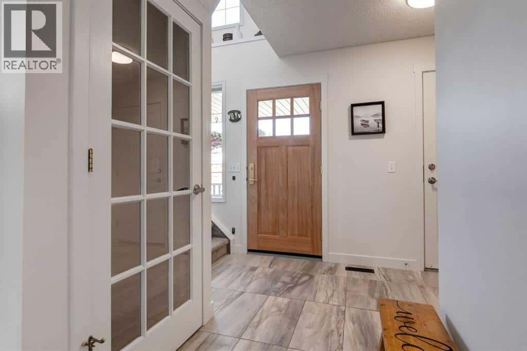 47 Springs Crescent SE — Airdrie, Alberta - Photo 5 of 49