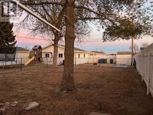 5605 57 Street — Taber, Alberta - Photo 3 of 21