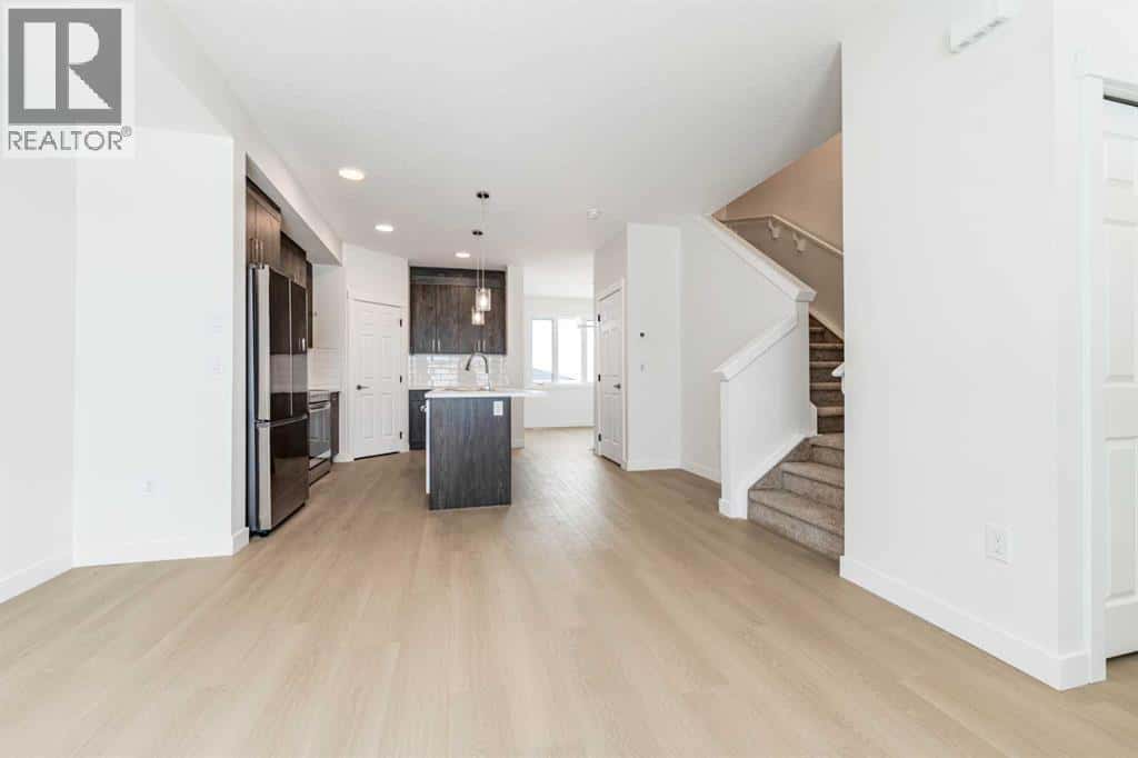 1921 McCaskill Drive — Crossfield, Alberta - Photo 4 of 50