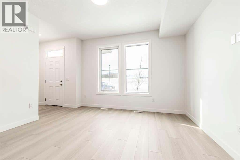 1921 McCaskill Drive — Crossfield, Alberta - Photo 5 of 50