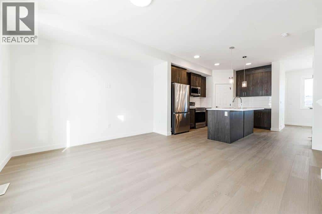 1921 McCaskill Drive — Crossfield, Alberta - Photo 3 of 50