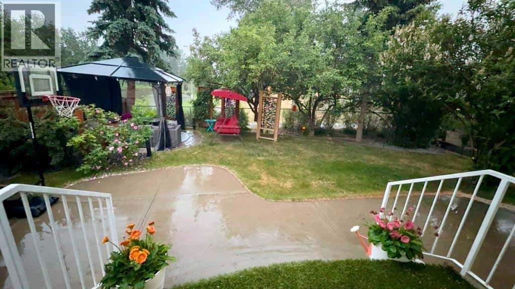 77 Summerfield Road SE — Airdrie, Alberta - Photo 2 of 47