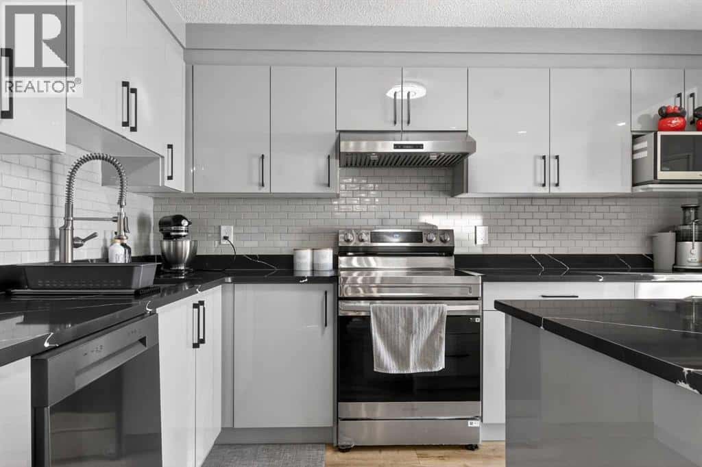 77 Summerfield Road SE — Airdrie, Alberta - Photo 5 of 47