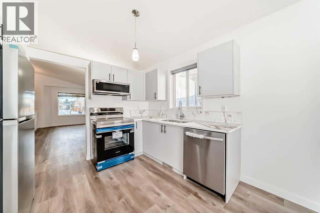 16218 Shawbrooke Road SW — Calgary, Alberta - Photo 5 of 50