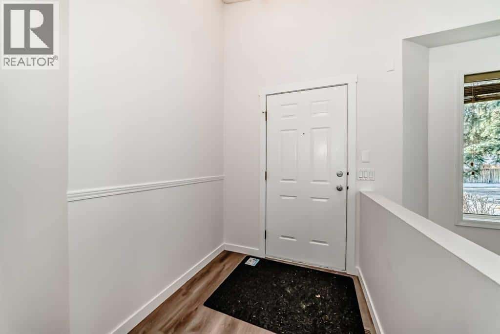 16218 Shawbrooke Road SW — Calgary, Alberta - Photo 3 of 50