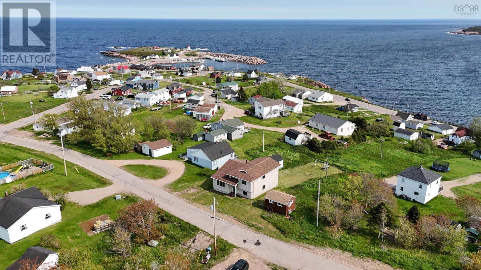 17 Cyrils Drive — Neils Harbour, Nova Scotia - Photo 4 of 42