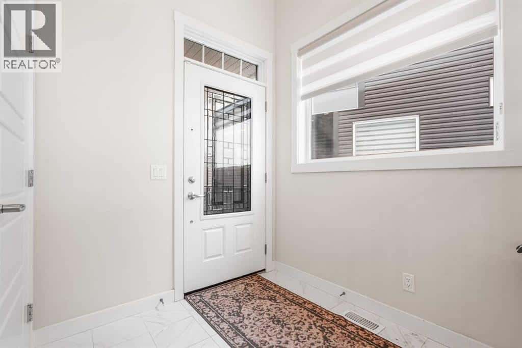 165 Sage Bluff Rise NW — Calgary, Alberta - Photo 4 of 50