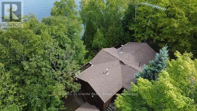 1119 WAMPUM ROAD — Dysart et al (Dudley), Ontario - Photo 2 of 50